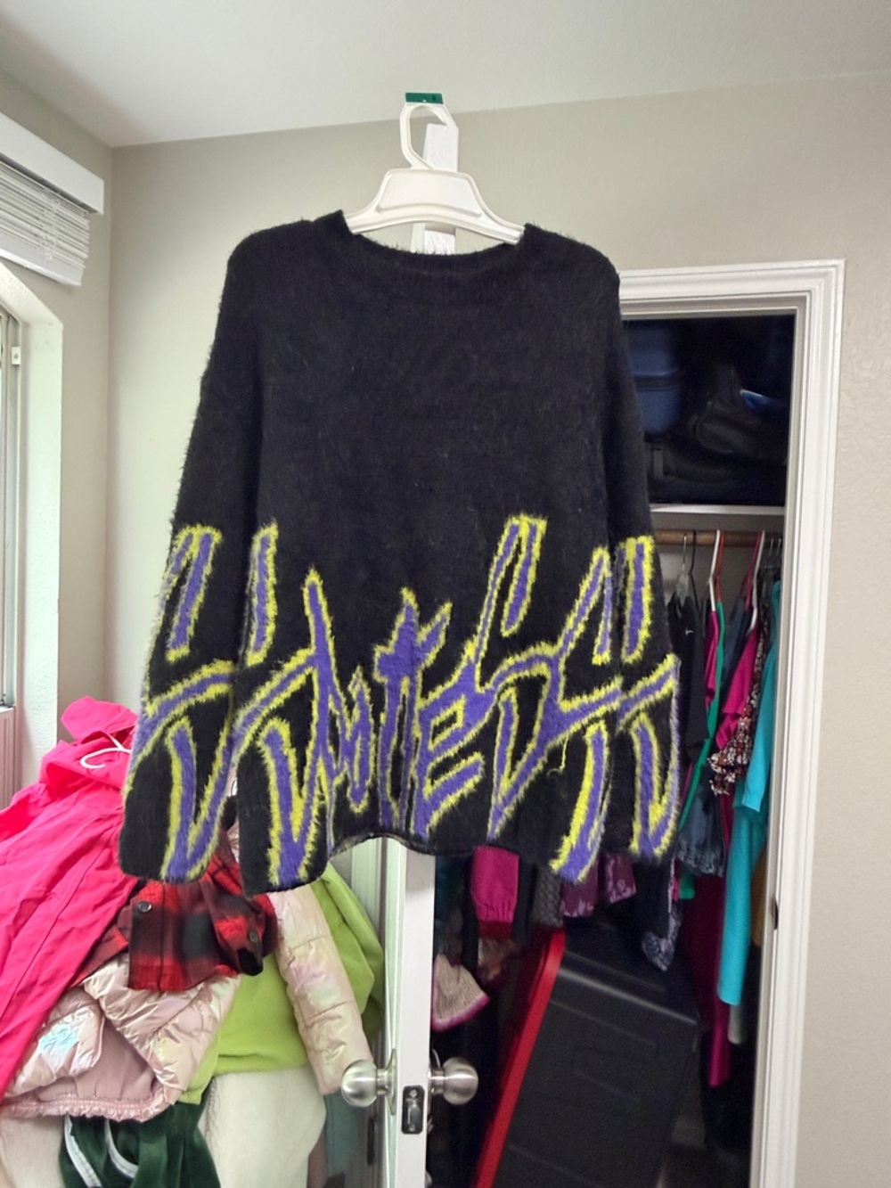 Adika Black Fuzzy Crewneck Sweater with Purple & Yellow Graphic